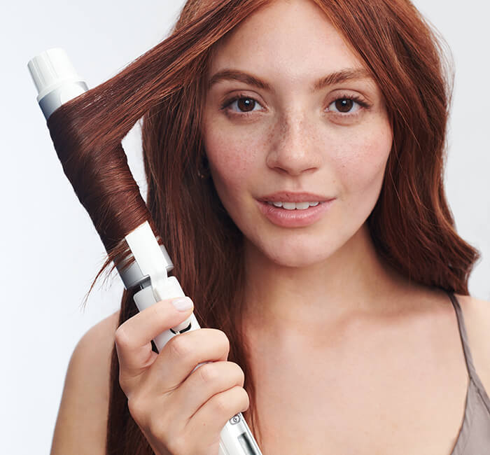 Model with Stylewinder Rotating Styling Iron